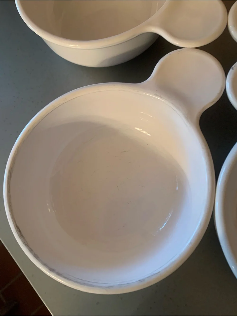 4 Corning Ware, SMALL grab it bowls with handles, can use in microwave.